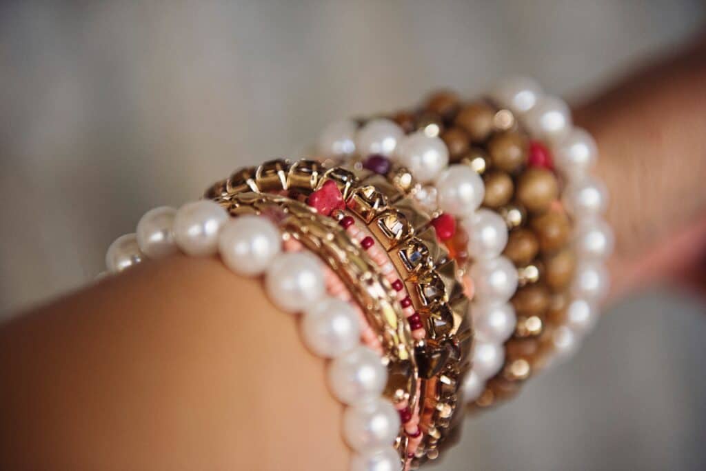 an arm full of jewelries