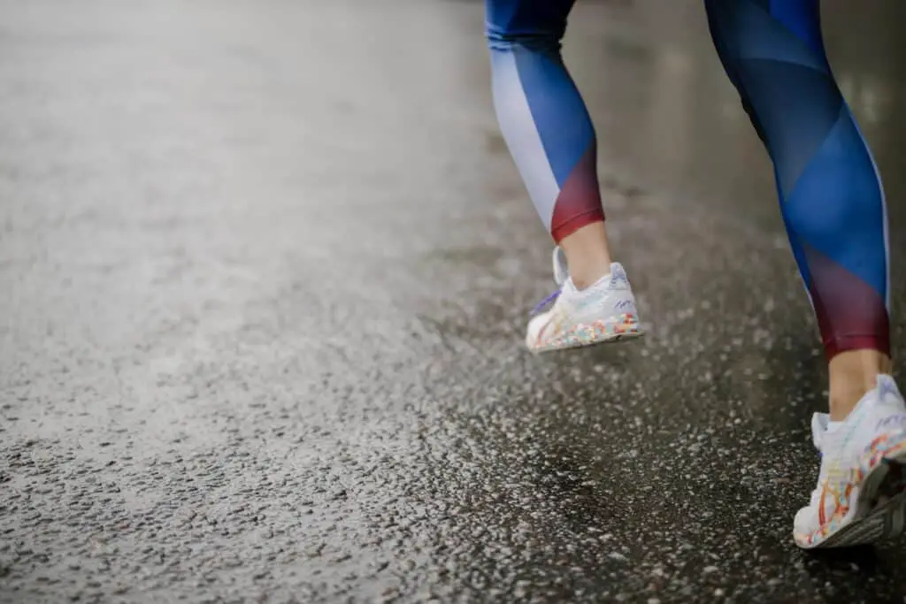 person running wearing printed leggings