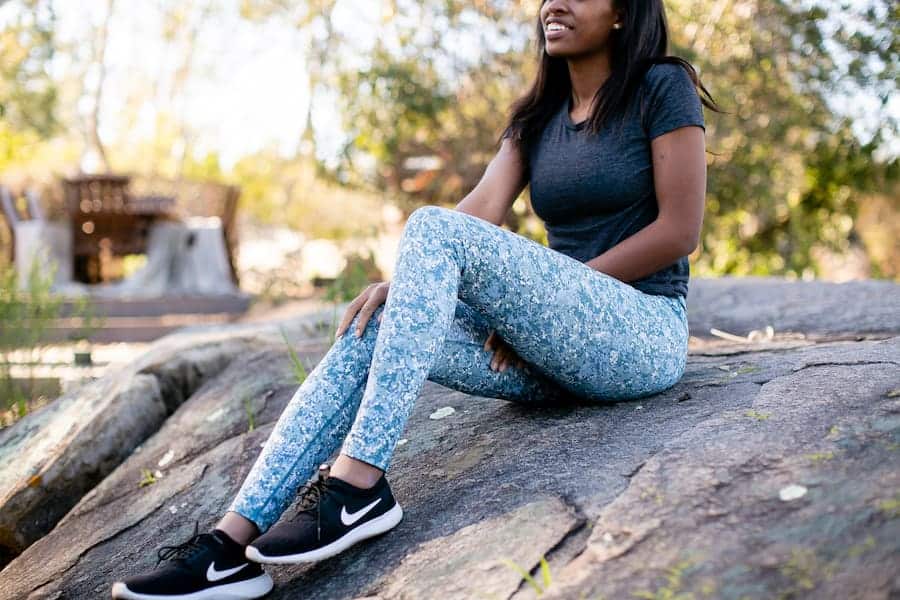 A woman wearing a camouflage designed leggings