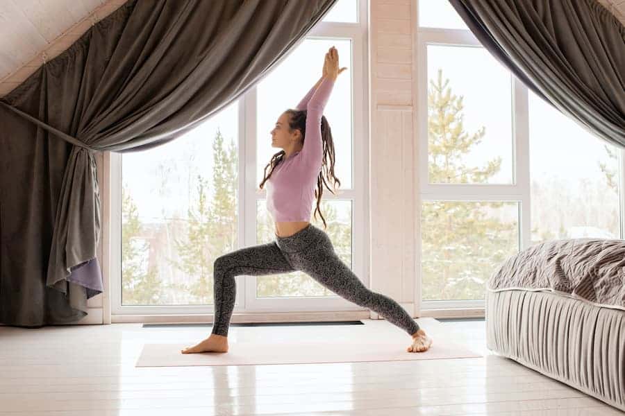 Woman wearing fit leggings while stretching