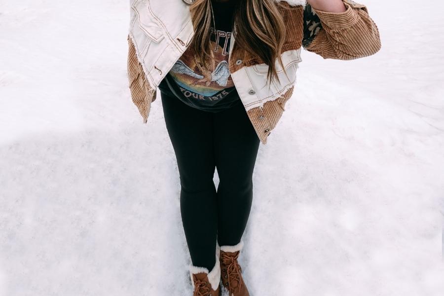 A close-up image of a person wearing a fleece lined leggings